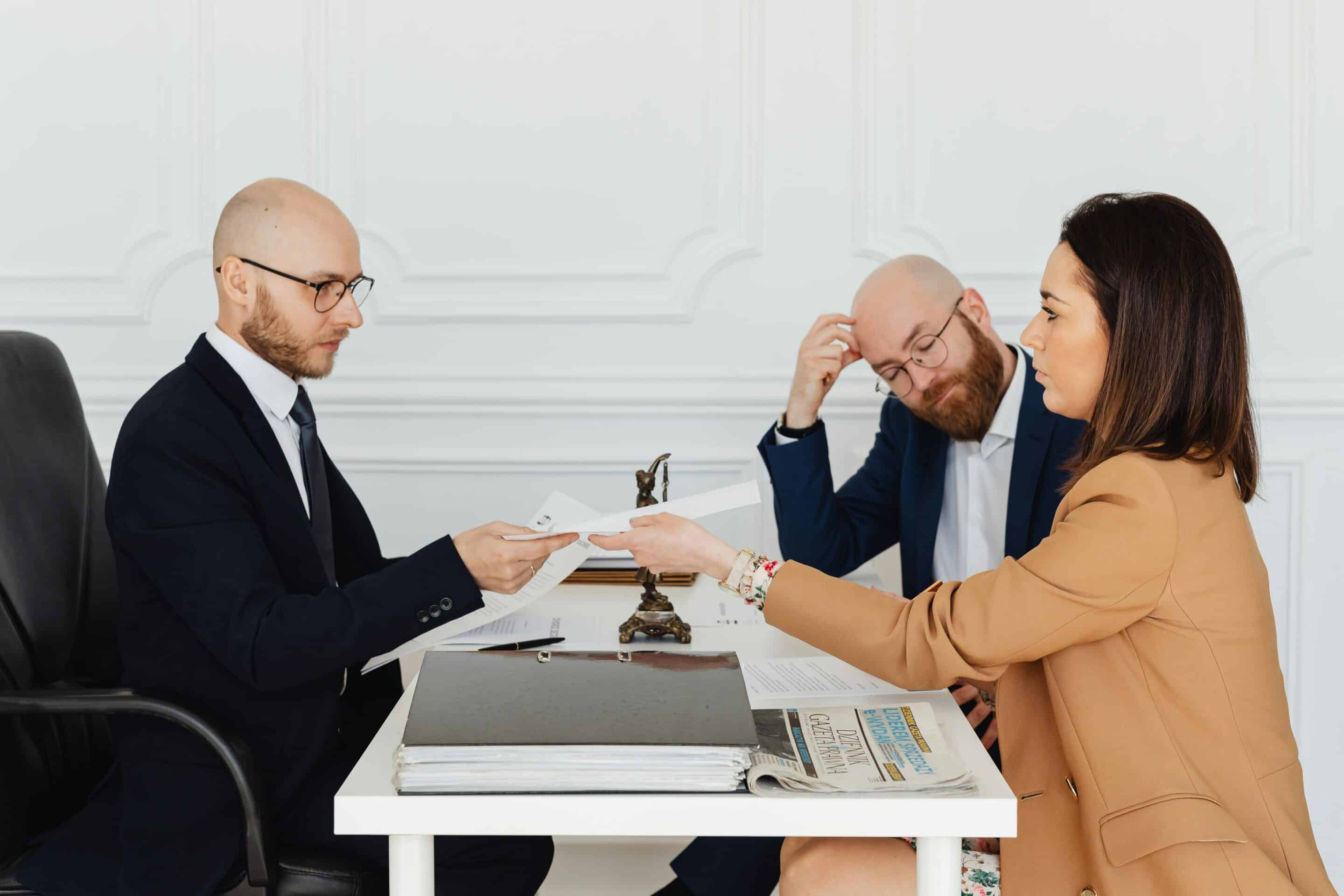 Person meeting with a lawyer in a professional office to discuss legal representation